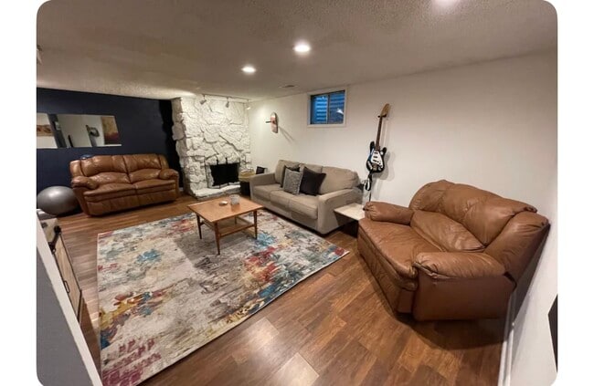 Basement Living room and workout equipment - 1792 Robb St Unit 1792