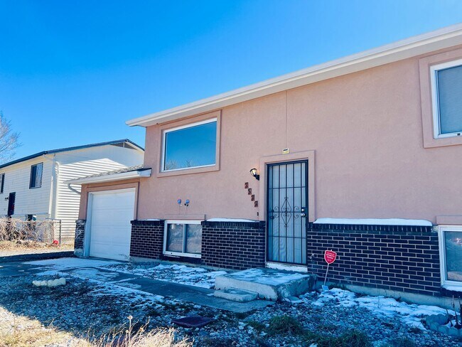 Photo - 4 Bed / 2 Bath Home with Finished Basement & Fenced Yard – Colorado Springs