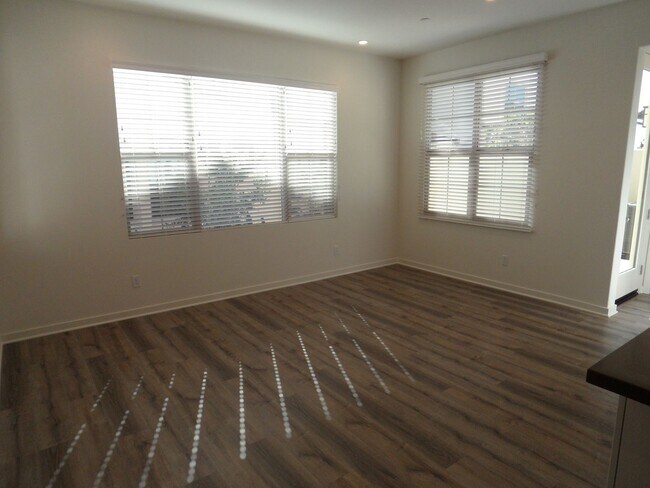Photo - 4BR 3BA two-story condo with 2 Car Attache...