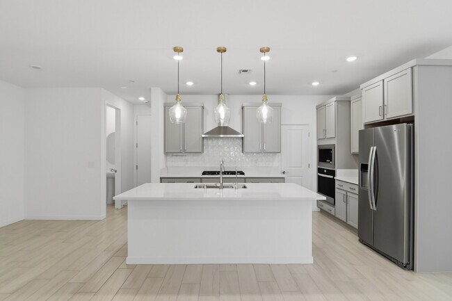 Photo - Experience refined living in this beautifully appointed 3-bedroom, 2.5-bathroom townhome spanning...