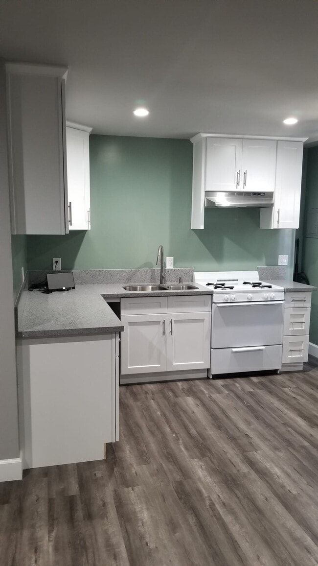 Building Photo - 6302 S Rimpau Blvd Unit 1/2