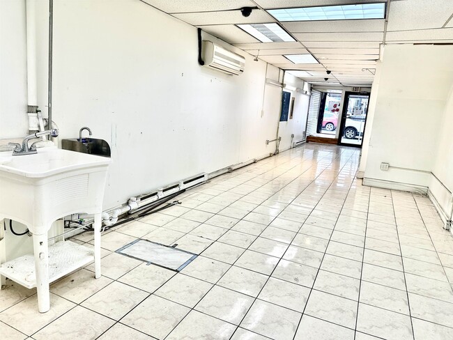 Photo - 413 Central Ave Unit left side store