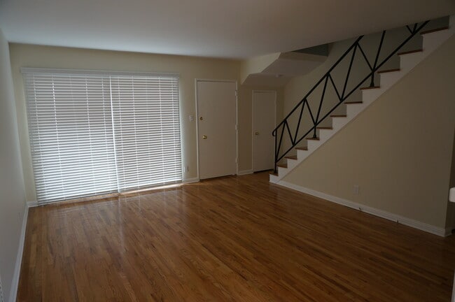 Entrance & Living room with large wall to wall windows