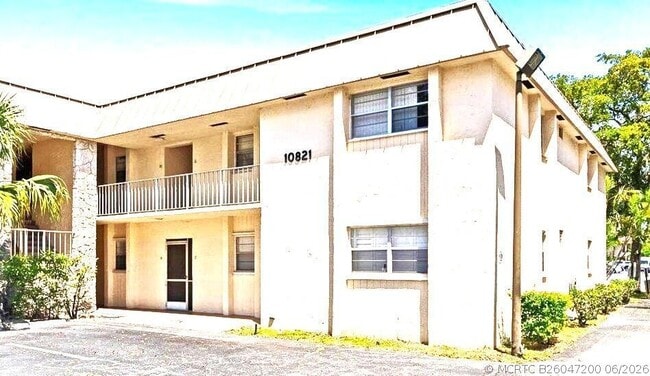 Building Photo - 10821 N Military Trl Unit Apt 19
