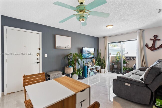 Building Photo - 7915 Harding Ave Unit 4 Rental