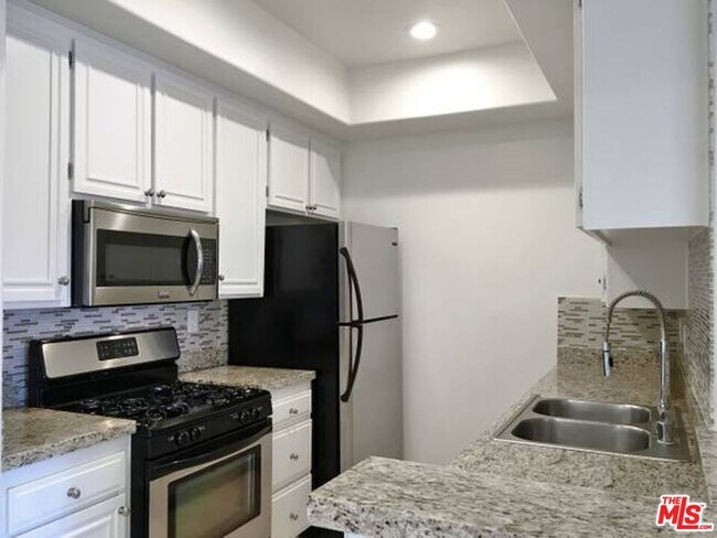 Photo - 14430 Benefit St Unit 104