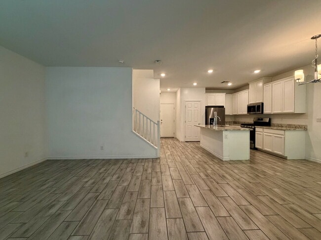 GATED 3 BED 2.5 BATH TOWNHOME WITH 2-CAR GARAGE, COVERED PATIO & COMMUNITY POOL