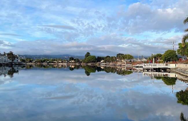 Building Photo - Rare prime waterfront home right on the San Mateo Lagoon, available August 15th!