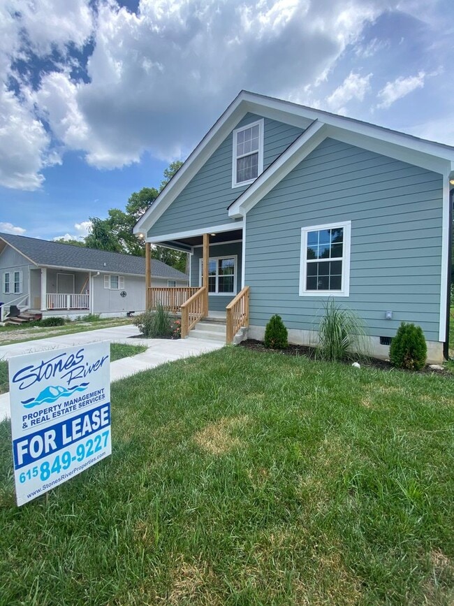 Photo - Charming 3 bed, 2 bath home! Fully fenced in, HUGE laundry room!