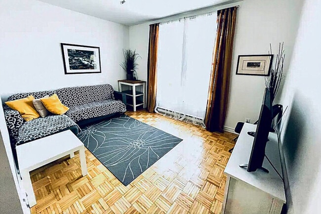 Building Photo - 4846 Rue Sainte-Catherine E Unit SI ID1228881P