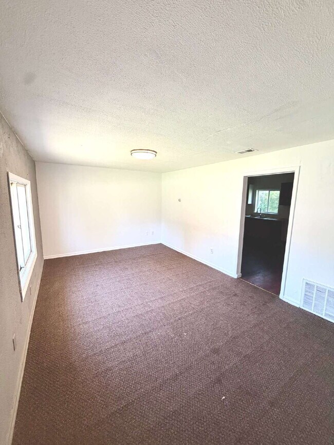 Ranch style 3-bedroom, 1-bath, attached garage and nice backyard!