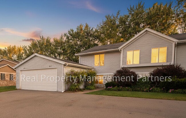 Building Photo - 2-Bed, 1-Bath Upper Unit with Garage & Porch – Steps from Paul Henry Trail