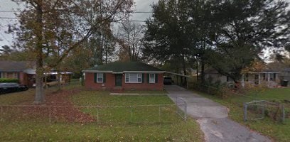 Building Photo - Brick Home with Carport and large fenced  in yard