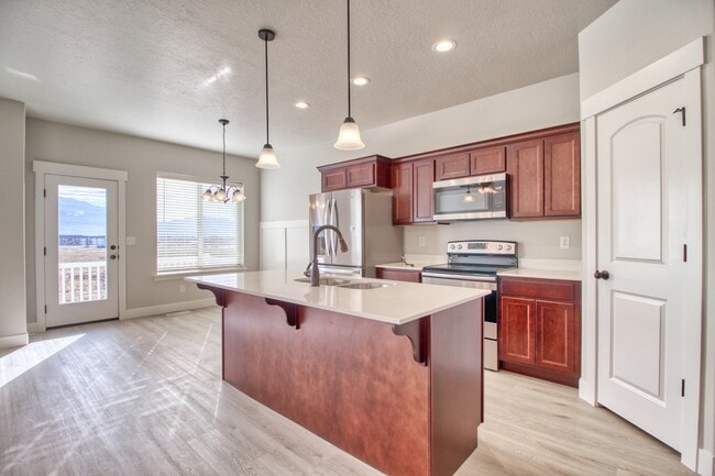 Upgraded kitchen with Stainless Steel Appliances - 2020 N 3830 W Townhome