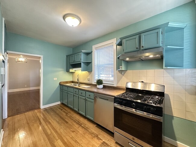 Building Photo - 6218 N Bell Ave Unit G06C