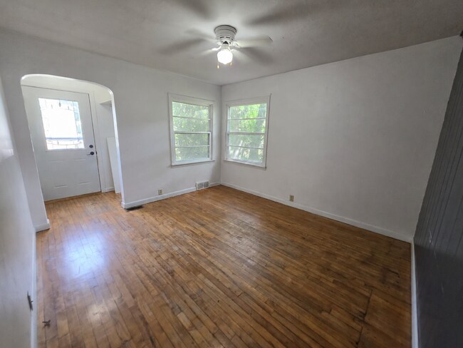 2 Bedroom, 1 Bathroom West Hill Home with Fenced Yard, Garage, & Bonus Living Space
