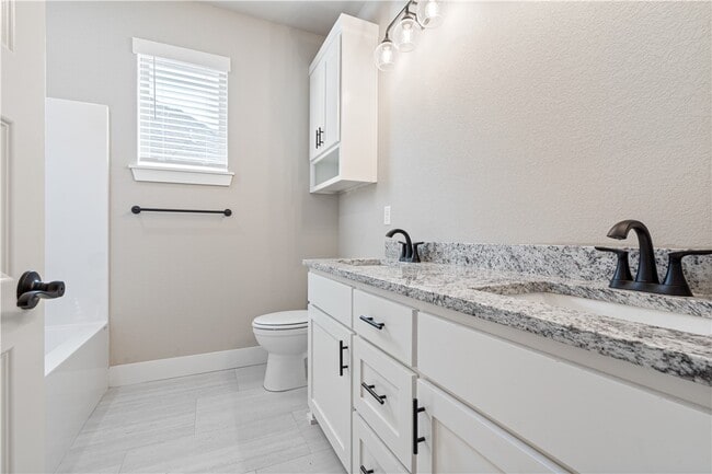 Building Photo - 7006 SW Orange Ave