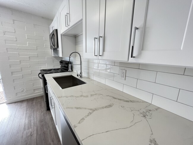 Remodeled kitchen view - Palisade Flats- Stunning Renovations