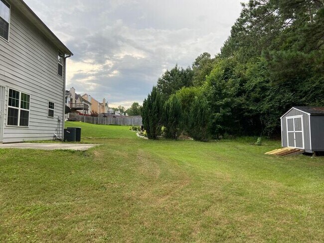 Photo - 4BR Home w/ Fireplace + 2-Car Garage in Snellville