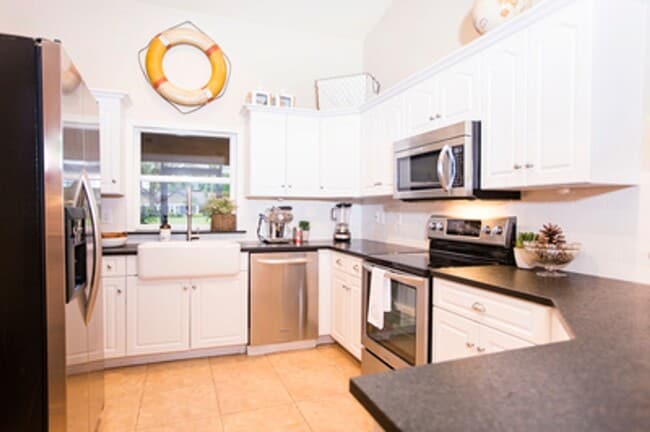 Photo - ANNUAL RENTAL - Beach Cottage with 2 Car Garage 'The Lakehouse' in tropical garden