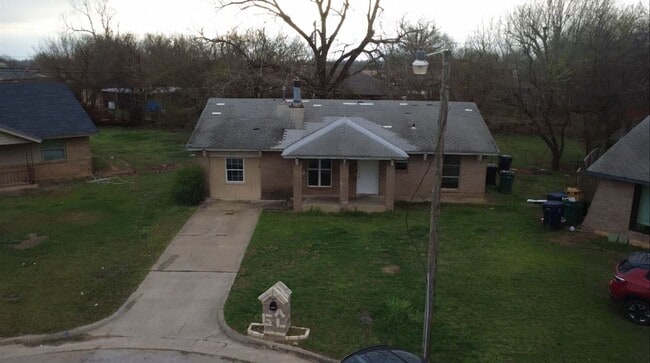 Photo - Charming 4-Bedroom Home with Spacious Yard!