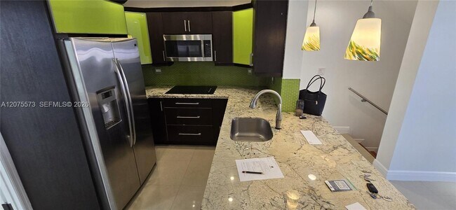 12005 SW 14th St Unit 407-D