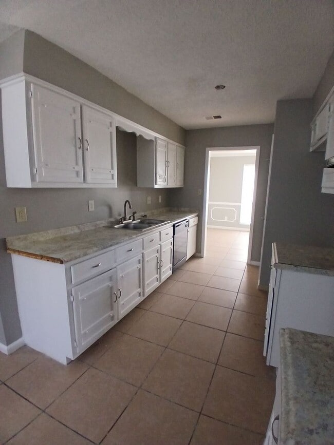 Photo - Blend of scale and sophistication in this expansive 3-bedroom, 2 bath residence - Open To Section 8