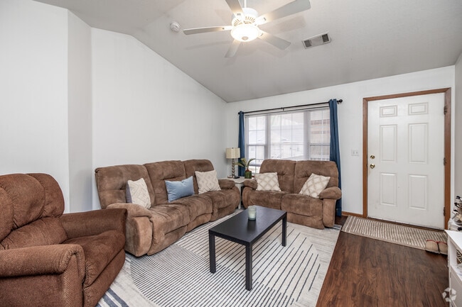 4BR, 2BA - 1,160SF - Living Room - West Ridge Apartments