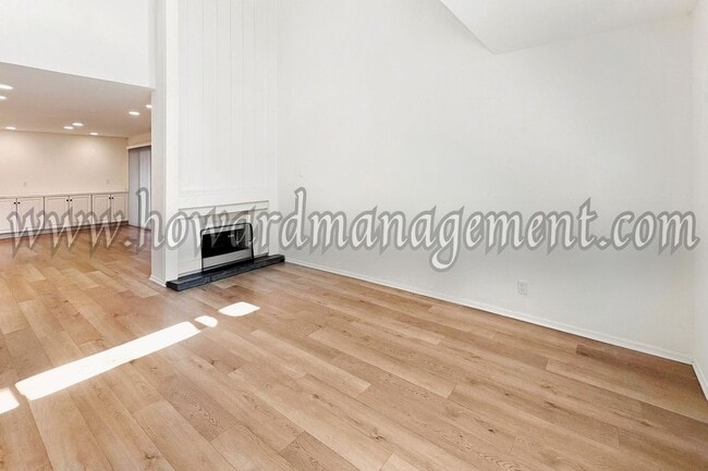 Building Photo - LAKE VIEW in LA! Majestic townhouse with high ceilings, three patios and lake view!