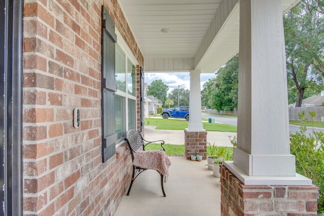 Photo - Spacious Cottage-Style Home Near UWF, Navy Federal & West Florida Hospital with Private Upstairs ...