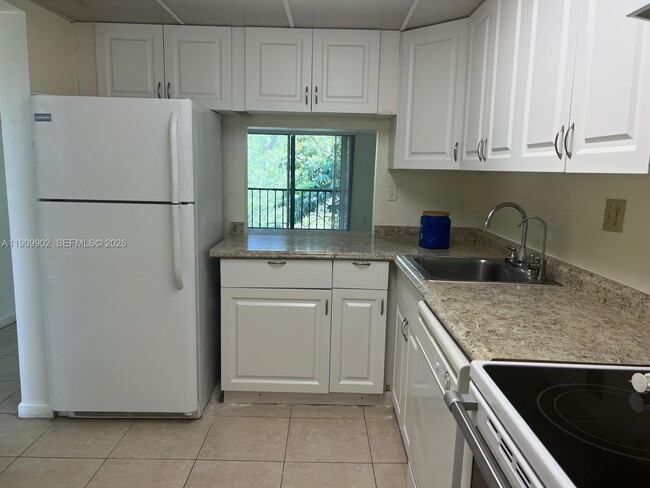 Building Photo - 7900 S Colony Cir Unit 308