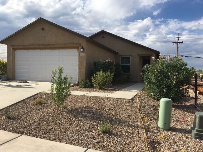 Building Photo - COMING SOON! New 3BR 2 BA Home w/ 2-Car Garage • Stainless Kitchen • Timer-Irrigated Yard in East...