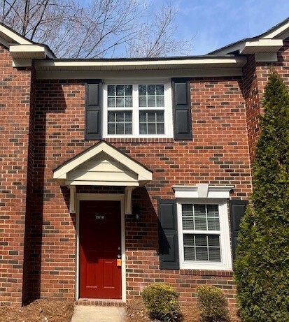 Building Photo - All-brick townhome living, minutes from it all.