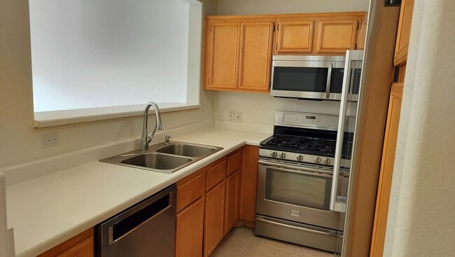 Photo - Townhome with Loft + Two Bedrooms/Baths - Designed for Comfort in Gated Community