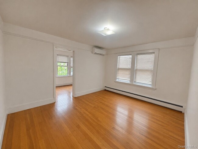 Building Photo - 77-18 169th St Unit 1fl