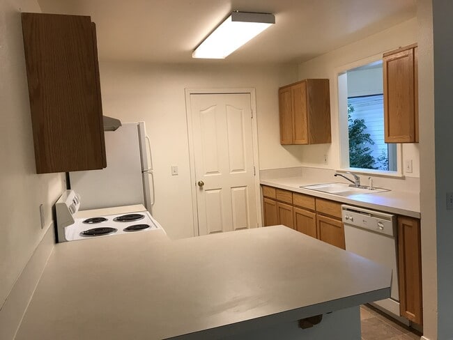 Photo - 2 bedrooms 1.5 bathroom with large living room, large kitchen PLUS 1 car garage. Bedrooms are huge