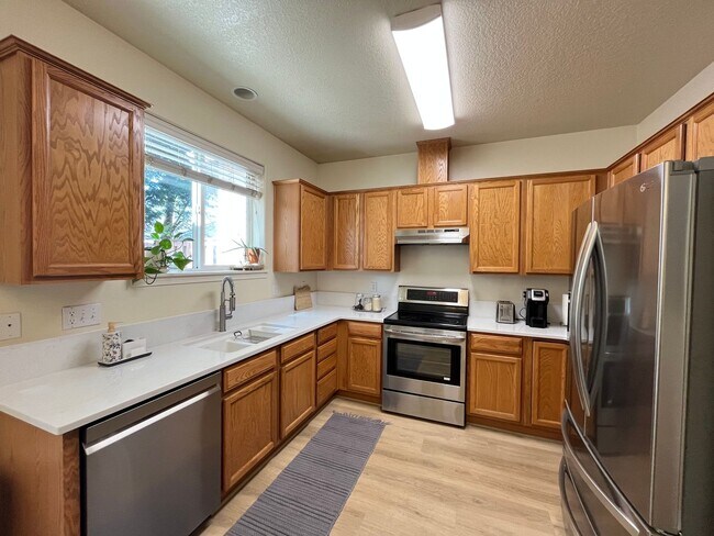 Photo - Chic and Spacious: 3-Bed Townhome with Pri...