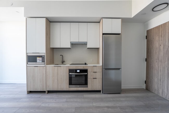 Building Photo - 1007 The Queensway Unit 812