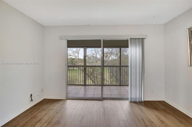 Building Photo - 1201 SW 128th Terrace Unit 402E Rental