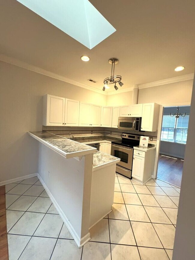 Photo - Merestone 1 level brick patio home. 2 Car garage, walk to The Point Shopping, restaurants and mov...