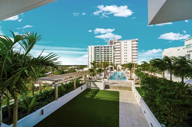 The Bridge pool deck and North Tower at Quantum Apartments.
