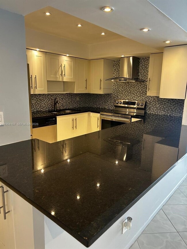Photo - 501 Three Islands Boulevard Unit 108