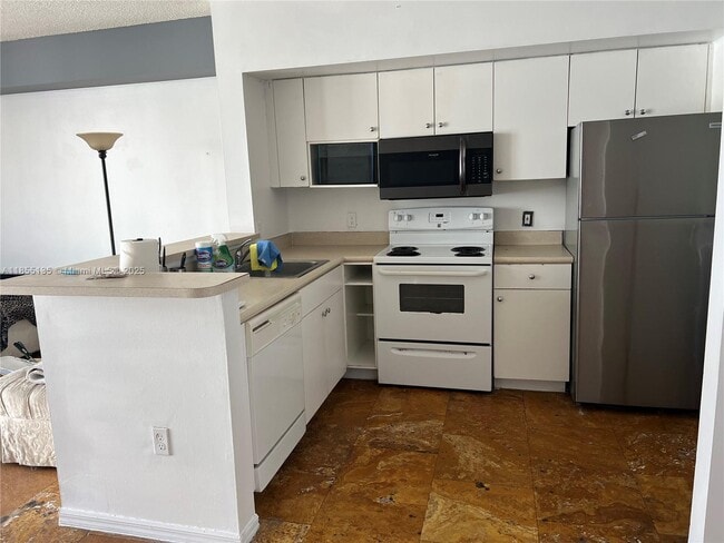Photo - 5077 NW 7th St Unit PH 4 (1604)