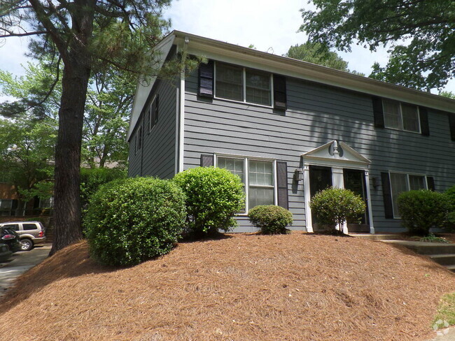 Building Photo - CORNER TOWNHOUSE/WOOD FLOORS/EXTRA WINDOWS...