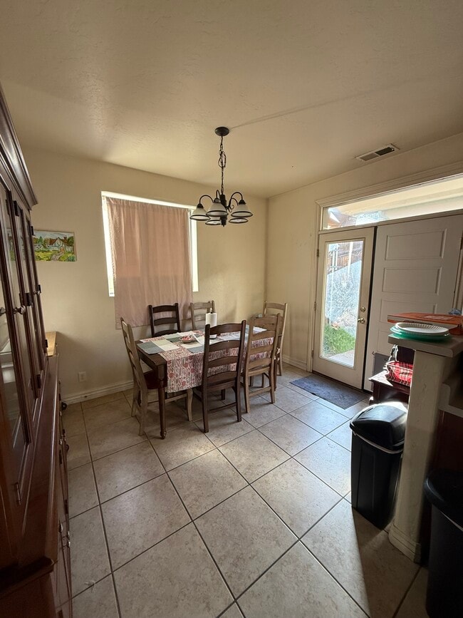 Kitchen and dining - 1486 E Ivy Ln Unit Bedroom 2