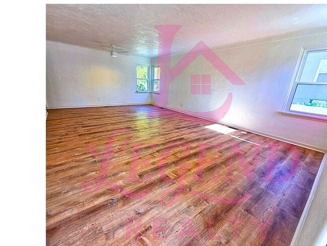 Photo - Charming 3-Bedroom with Huge Yard & Covere...