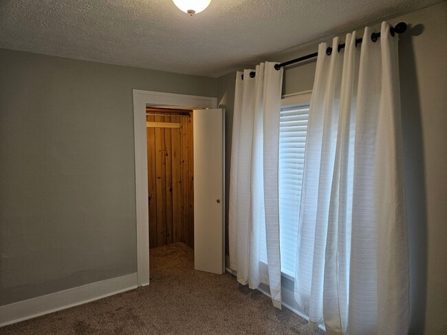 Bedroom with walk in closet