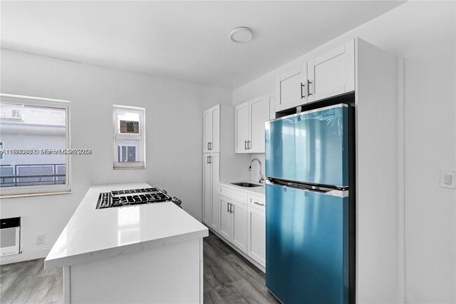 Building Photo - 780 73rd St Unit 7