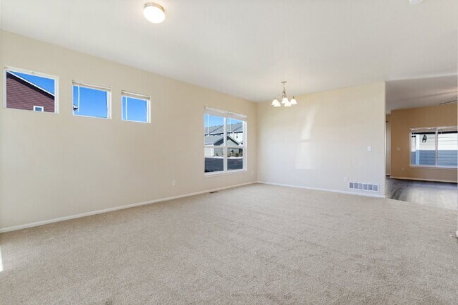 Photo - Spacious End-Unit Townhome with Greenbelt Views and Detached 2-Car Garage