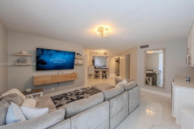Building Photo - 10451 W Broward Blvd Unit 201